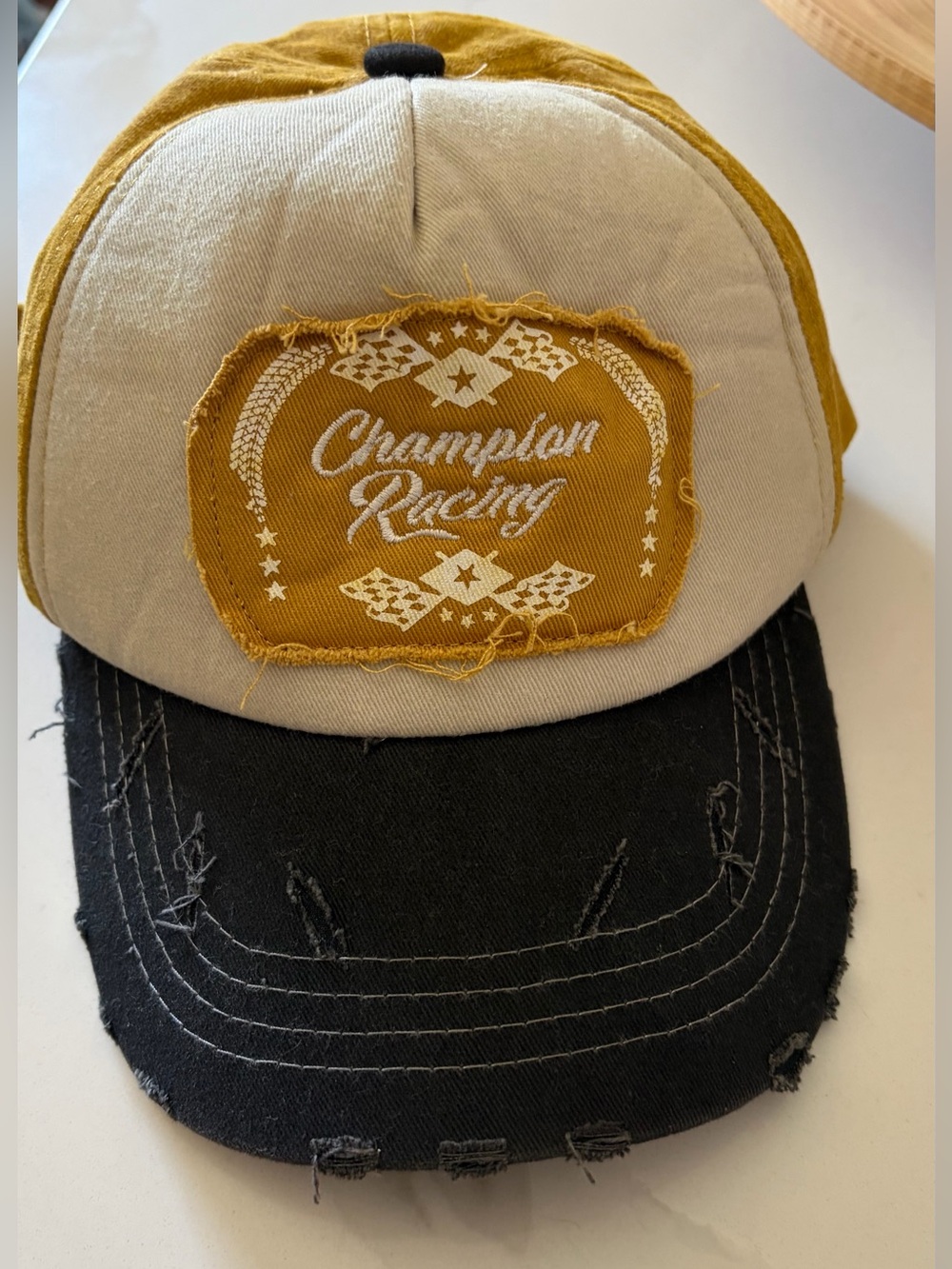 Free People NWOT Mustard & Black Trucker Hat with Woven Label